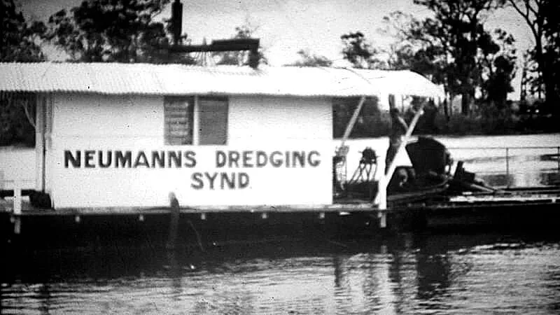 Historic black and white photo of a dredging operation on the Currumbin mineral sands site