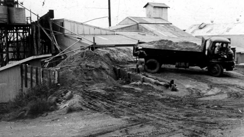 Historic black and white photo of the old sand processing plant